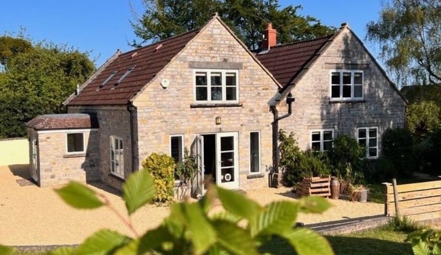 Farmhouse located on an English vineyard offering rustic luxury.