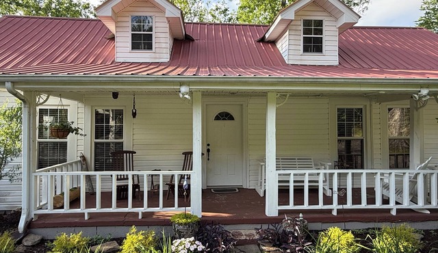 Farmhouse on Rock Creek Farm in Belmont. Enjoy a treehouse & wade Rock Creek