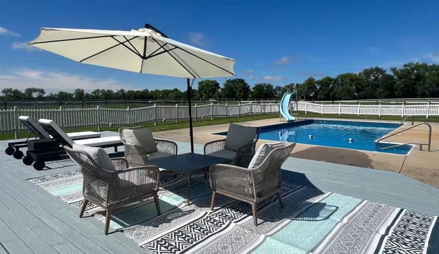 Farmhouse with Heated Pool on almost 160 Acres!