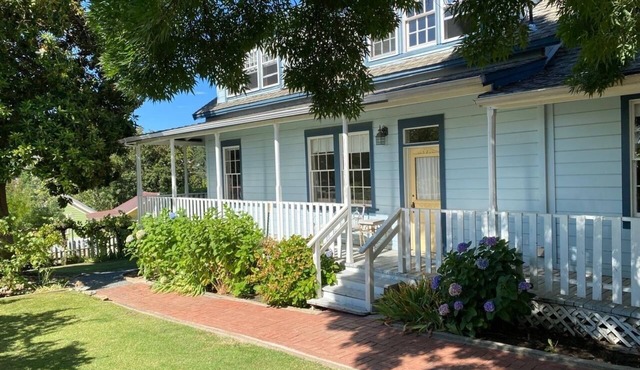 Farmhouse with Hot Tub, charming gardens, serenity, 2 blocks to Main Street!