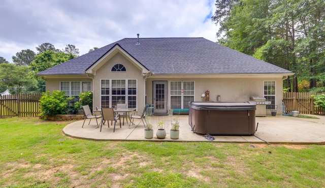 Fayetteville Retreat with Hot Tub and Fenced Yard