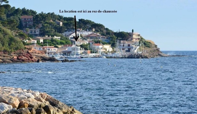 Feet in the water at the little port of Les Oursinières -