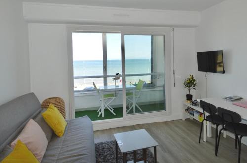Fenêtre sur mer, loggia vue mer en bord de plage