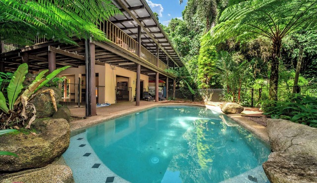 Fern House ~ your serene rainforest retreat.