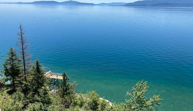 Fill your soul w/400' of PRIVATE waterfront w/dock, lift, diving board & more!