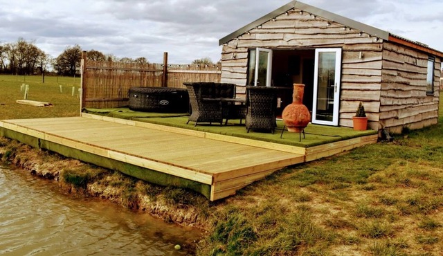 Fir Cone Cabin, set in the beautiful countryside next to a private fishing lake.