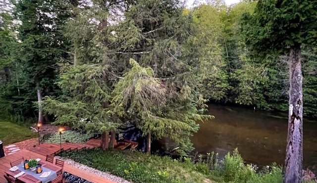 Firefly Lodge on the Boardman River with Hot Tub and Woodstove