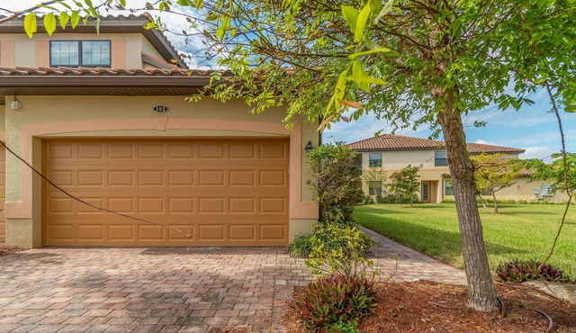 First Floor Coach Home in Gated Community