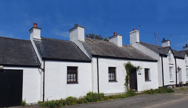 Fisherman’s Cottage by the Beach and Lighthouse