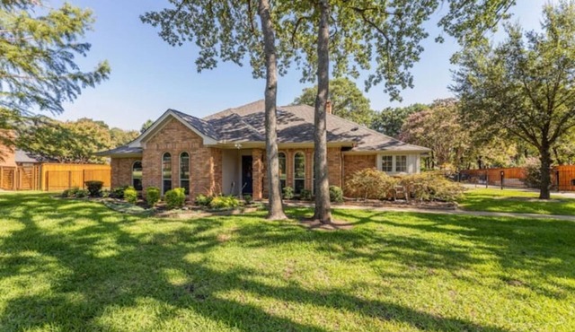 Five bedroom & three bathroom .69 acres with hot tube seats 8. 12 miles from DFW