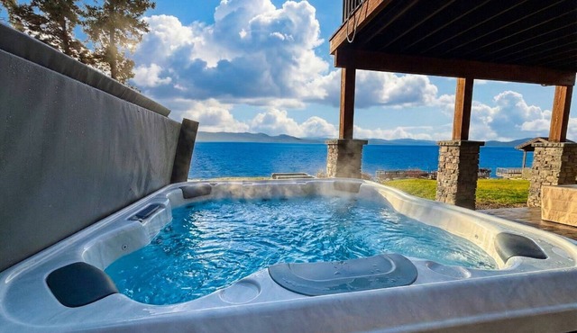 Flathead Lakefront Beauty | 5BR Retreat in Big Arm MT w/Dock, Hot Tub, Fire Pit & Games! Sleeps 14