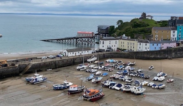 Floating Beach Hut. Seagull eye view over the famous iconic Tenby harbour.