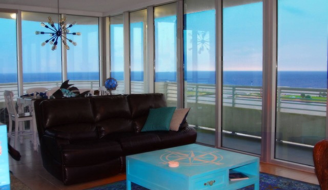 Floor To Ceiling Windows Overlook The Gulf of America's Pristine White Beaches