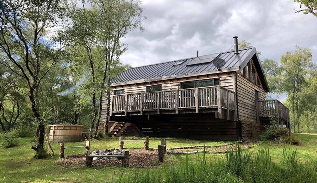 Flora is a Well equipped, Scandinavian style log cabin with wood fired hot tub