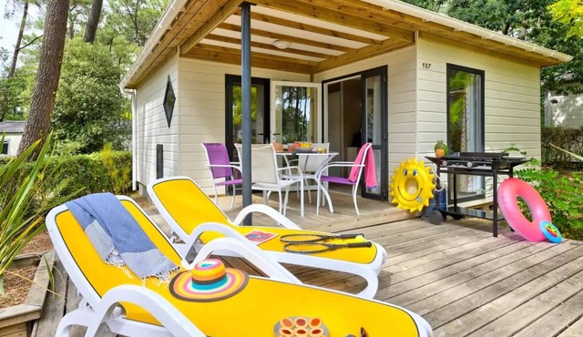 Flower Camping Les Biches * - Premium Cottage 2hc - 32 to 50m2 terrace cover. - TV - LV - FREE WIFI 4 people