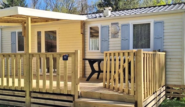 Flower Camping du Lac de la Seigneurie * - Mobil home Bermuda Comfort 30m2 (3 bedrooms) + semi covered terrace of 18 m2 + TV 6 persons