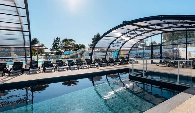 Flower Camping Jardins de Kergal * - Chalet 2Ch Comfort - TV 4 persons