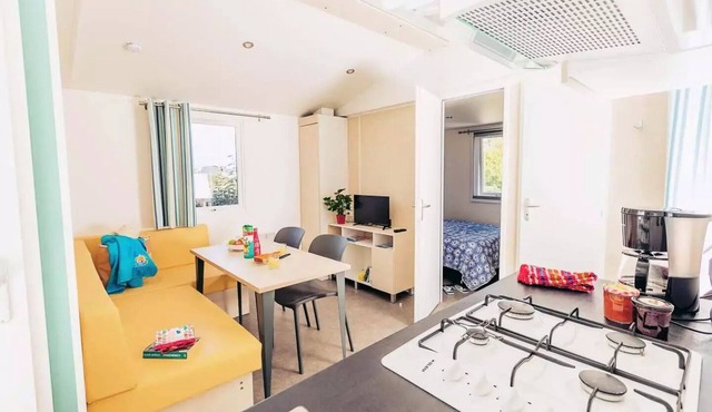 Flower Camping La Pointe du Talud * - Comfort mobile home BAHIA 27m² - 2 bedrooms + semi-covered terrace for 4 people