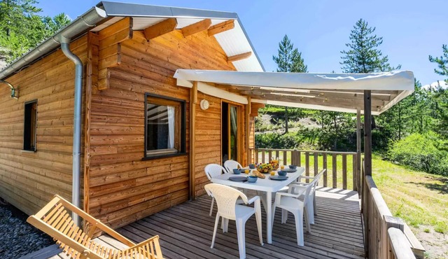Flower Camping Le Clot du Jay * - Wooden chalet Comfort 35m2 3 bedrooms + TV + Terrace 8 persons