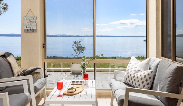 Foreshore Delight offers a tranquil holiday retreat with breathtaking water views