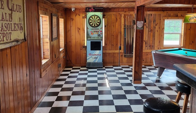 Former bar with games, multiple kitchens, 5 bedrooms, sleeps 14.