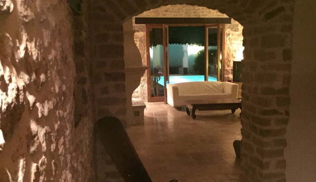 Former sheepfold in an old village with garden and swimming pool