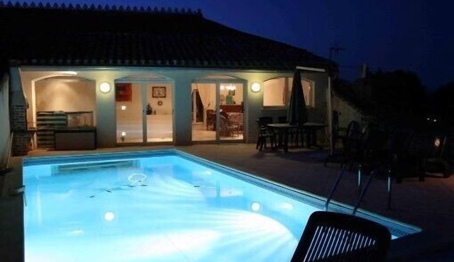 Former grocery store with pool on the roof (transparent side)