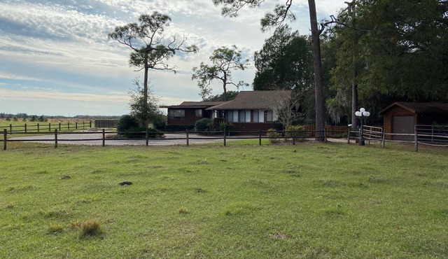 Former Hunting Lodge on 24 Acres with Lake with heated pool