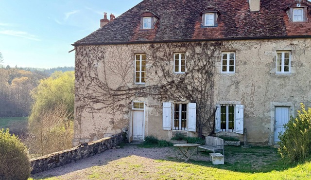 Former mill of the Château de Bourbilly transformed into a pretty country house