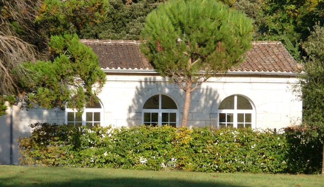 Former orangery in a 2-hectare wooded park