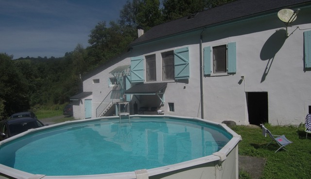 Former school with swimming pool.