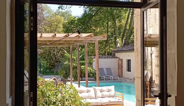 Former stables of Château Emile Loubet next to a park.