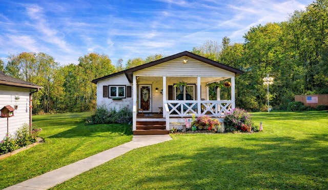 Four bedroom/three bath. Ideal Winter getaway. Snowmobile trail access.