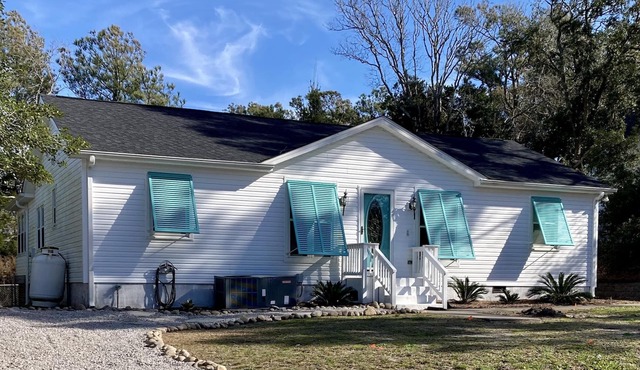Four bedroom home and short walk to the beach!