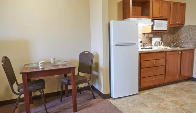 Four Pet-friendly Suites with Fully-equipped Kitchens & Free Parking!