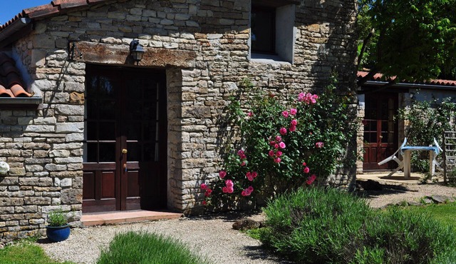 Four spacious cottages with outdoor heated pool and play areas.