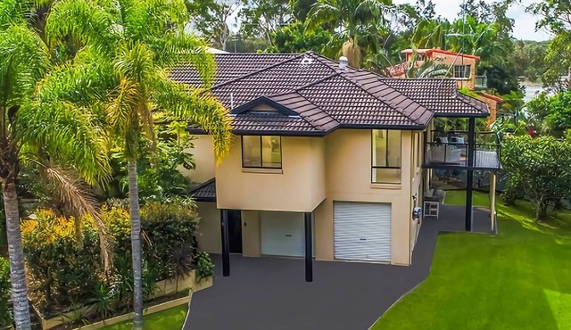 Frangipani is a grand 5 bedroom home situated by the water’s edge in the quiet Hyland Park