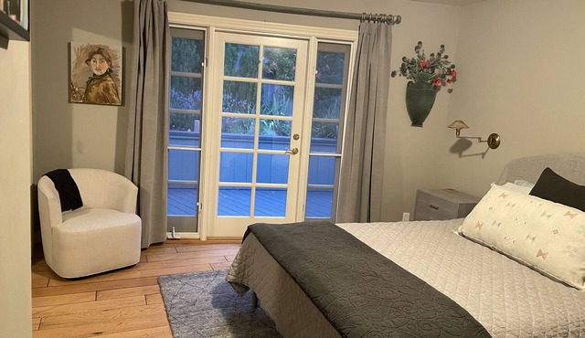 French Country Retreat with Sunny Hillside Location.