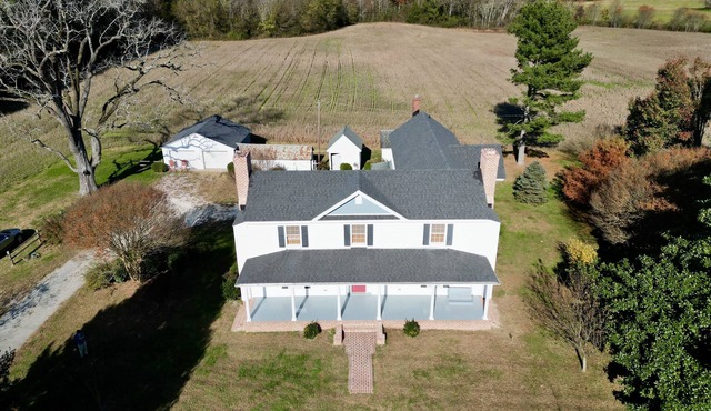 Freshly renovated c1900 Farmhouse in Plainview surrounded by crop fields