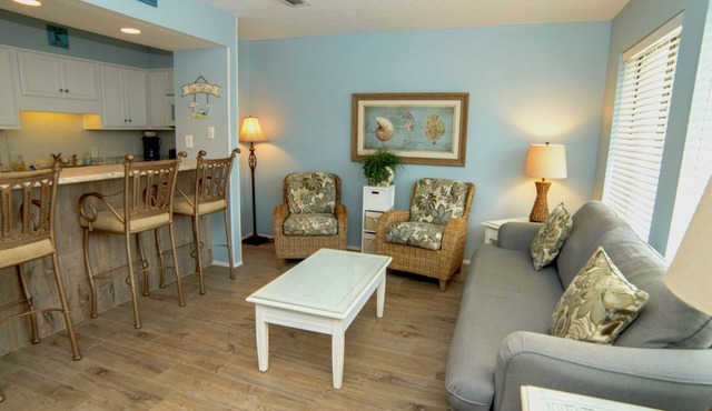 Freshly updated beachfront condo with stunning views. Sleeps 4. Onsite Pool.