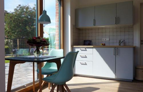Frida - Feines Studio mit Südterrasse in Steinkirchen