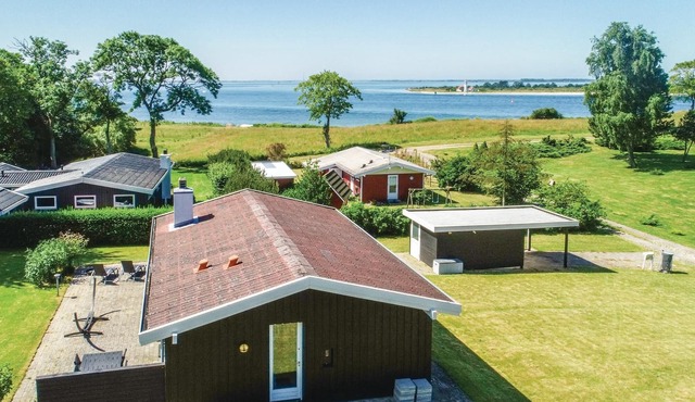 From this cottage you have a fantastic view over the sea and to Enebær Odde with its characteristic