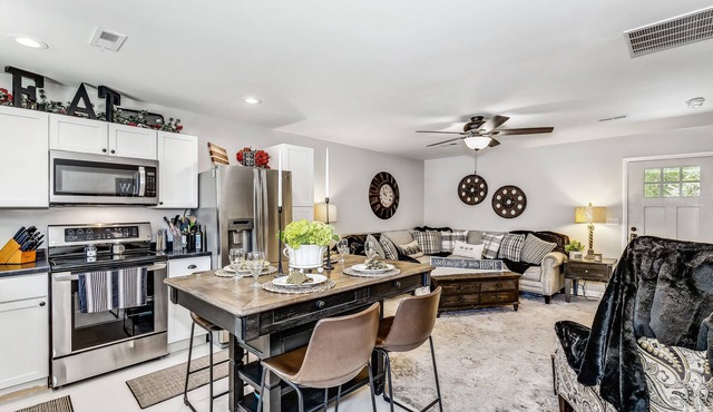 Front door parking, private covered patio with fenced in backyard