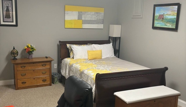 Full bed, closet, mounted tv. Entire apartment included at this fabulous rate.