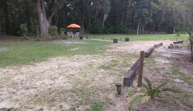 Full hook up RV Trailer site on private 1 acre Conveniently located