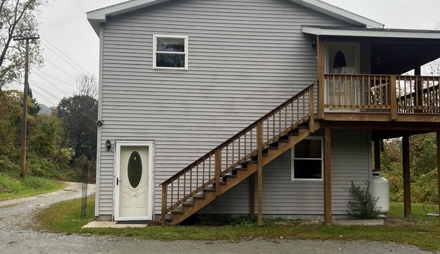 Full two story home with wrap around deck and fire pit!