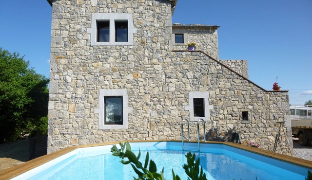 Fully air-conditioned stone villa with panoramic views and private pool.