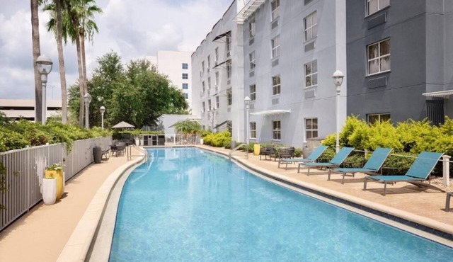 Fully Equipped Kitchen in Modern Suite with Airport Shuttle and Swimming Pool