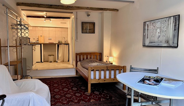 Fully equipped room in village apartment