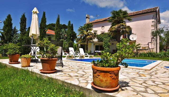 Fully fenced mediterranean stone villa